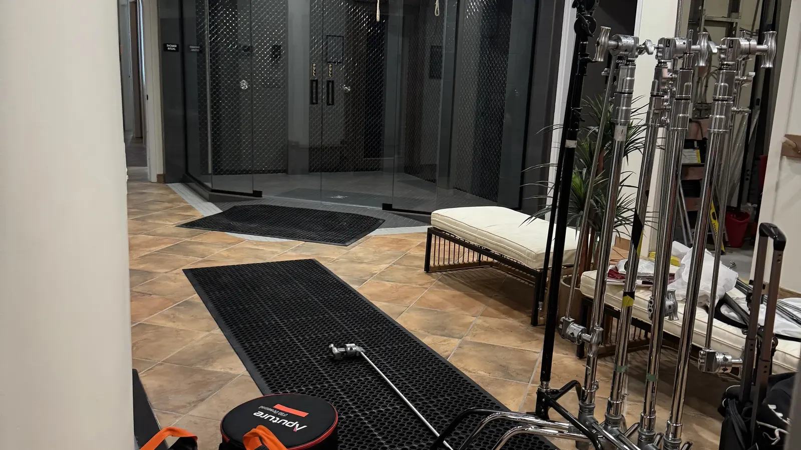 Lighting and grip stands staged inside the Cleopatra's Rituals thermal area.