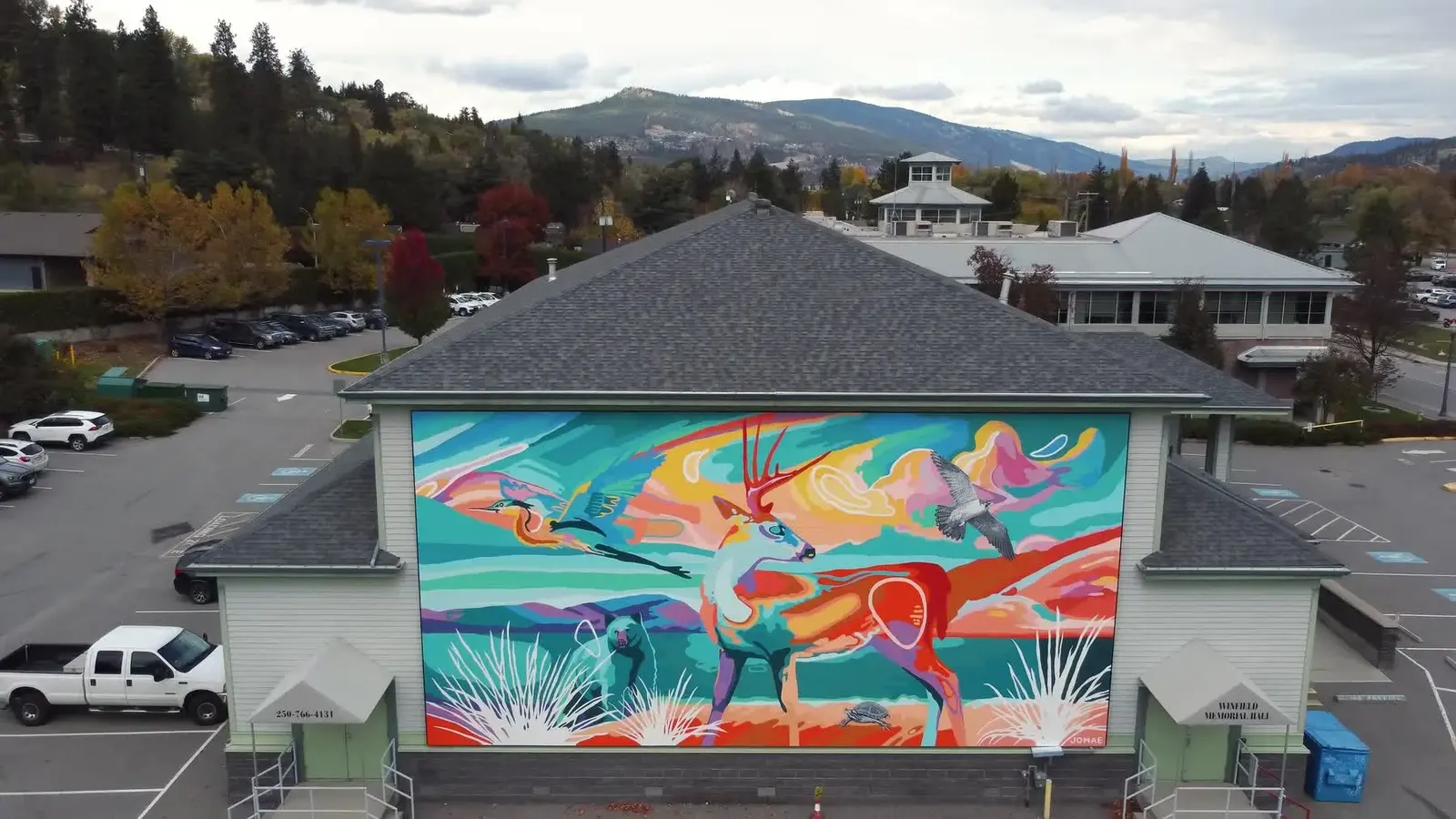 An aerial view shows the Gratitude mural across Winfield Memorial Hall in Lake Country.
